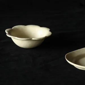 Artist Collaboration Plain Cream Ceramic Bowls in oatmeal — front view