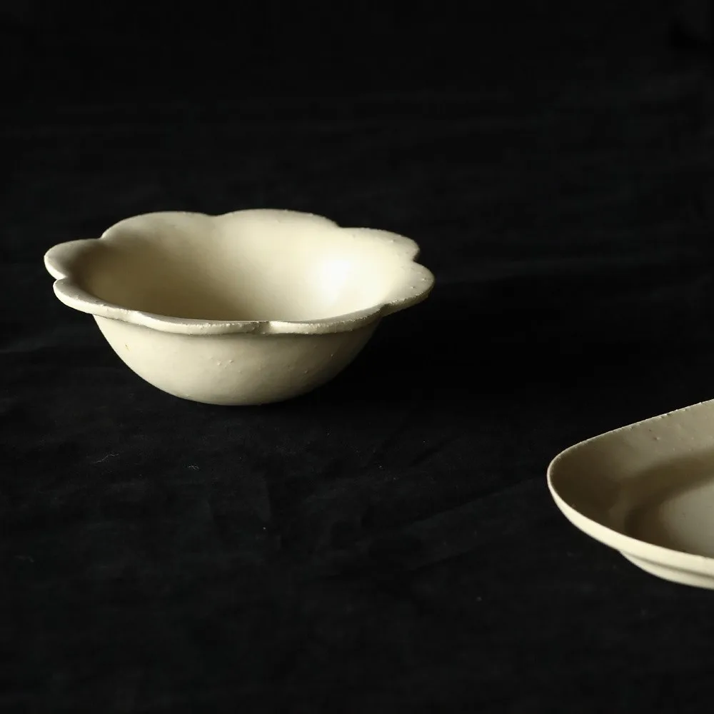 Artist Collaboration Plain Cream Ceramic Bowls in oatmeal — front view