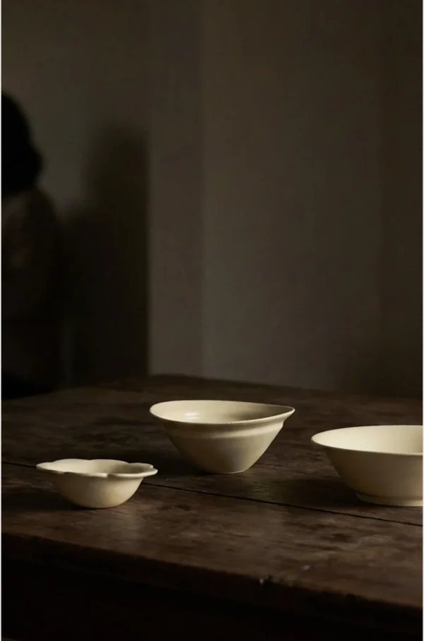 Artist Collaboration Plain Cream Ceramic Bowls in oatmeal — in a room setting