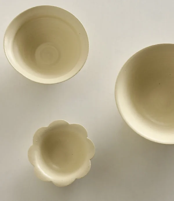 Artist Collaboration Plain Cream Ceramic Bowls in oatmeal — in a room setting
