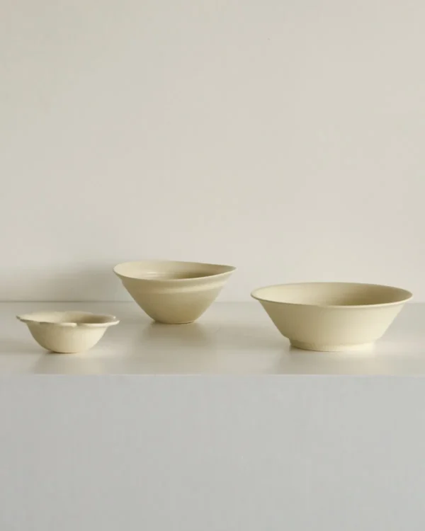 Artist Collaboration Plain Cream Ceramic Bowls in oatmeal — in a room setting