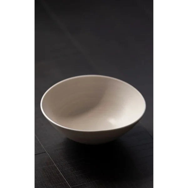 Artist Collaboration Plain White Conical Salad Bowl in ivory — in a room setting
