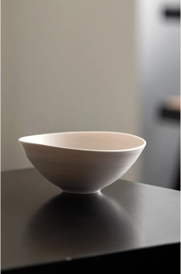 Artist Collaboration Plain White Conical Salad Bowl in ivory — in a room setting