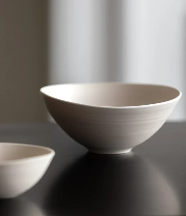 Artist Collaboration Plain White Conical Salad Bowl in ivory — in a room setting