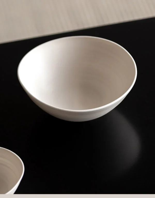 Artist Collaboration Plain White Conical Salad Bowl in ivory — in a room setting