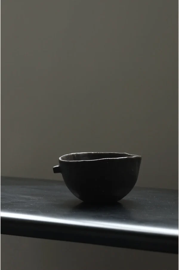 Artist Collaboration Dark Stoneware Eared Bowl and Plate in clay — in a room setting