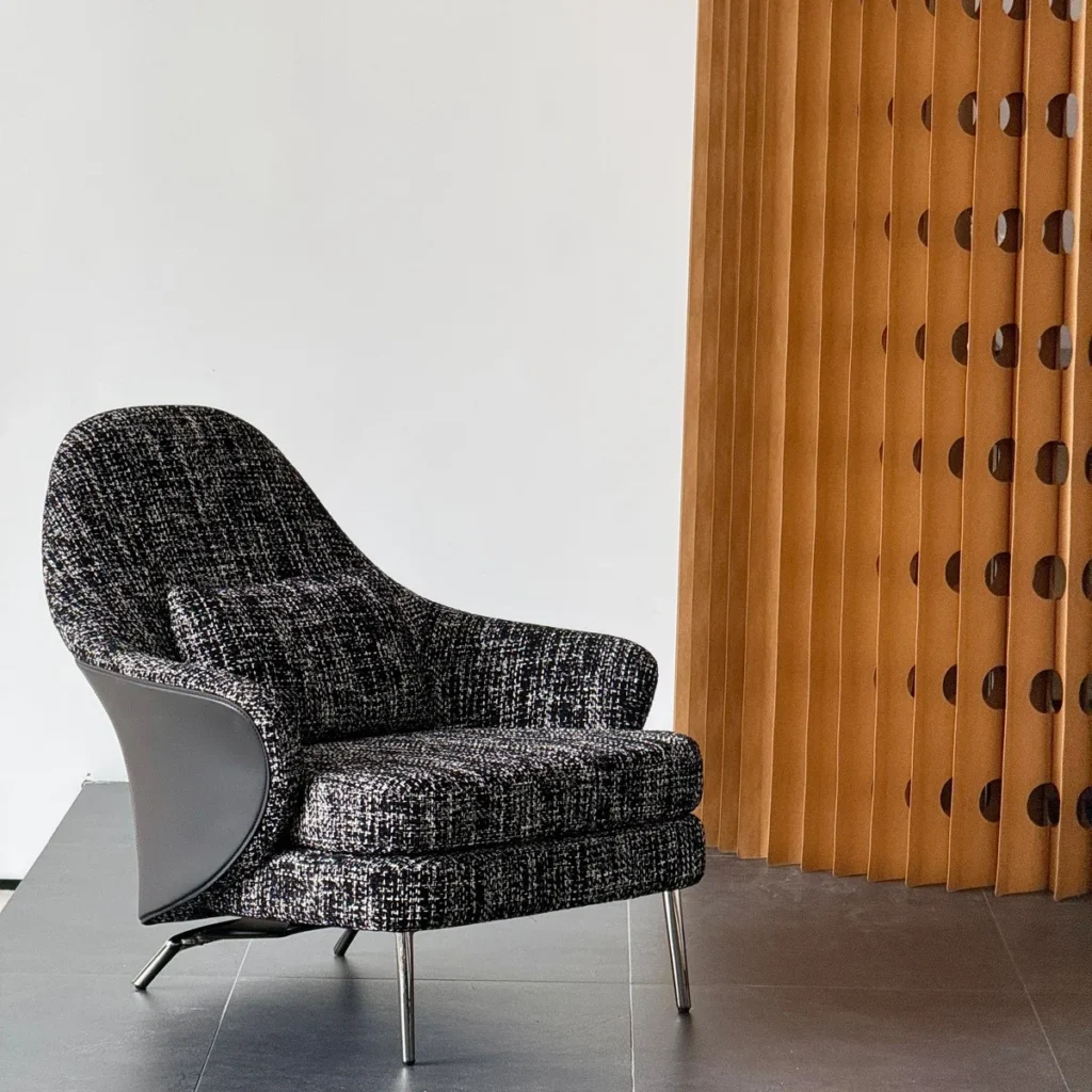 Saddle Leather Corset Lounge Chair in Black Tweed — front view