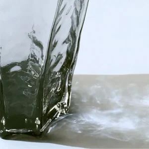 Designer Angular Clear Glass Vase in slate — in a room setting