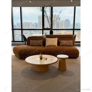 Armless Irregular Curved Sofa in Mocha Cotton Linen — in a room setting