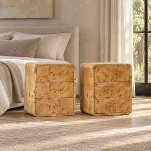 Rounded Burl Veneer Three-Drawer Nightstand in natural oak — in a room setting
