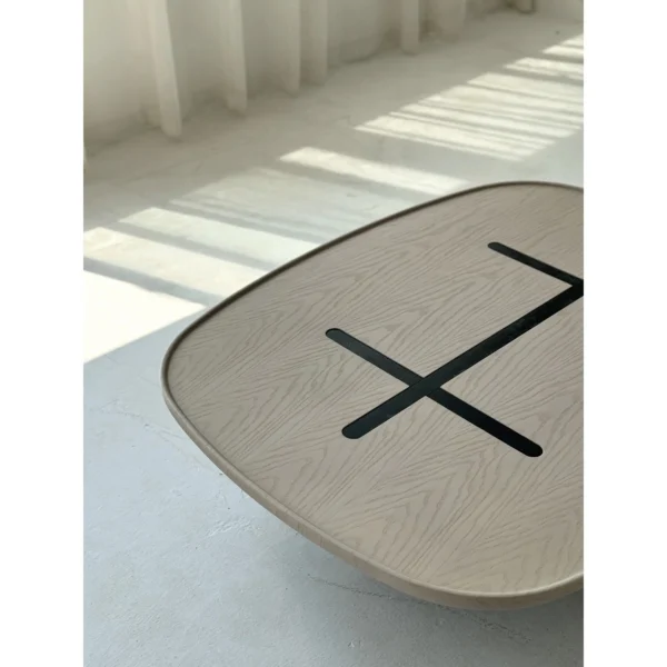 Cream Stone Coffee Table in oatmeal — in a room setting