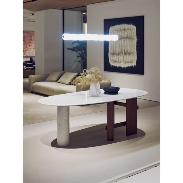Oval Marble Dining Table on Ash and Marble Legs in ivory — in a room setting