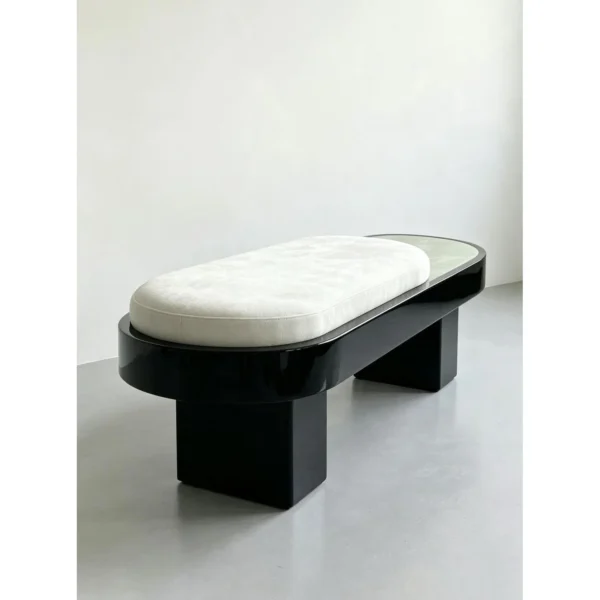 Oval Jade Stone Bench with Velvet Cushion on Black Base in olive — in a room setting