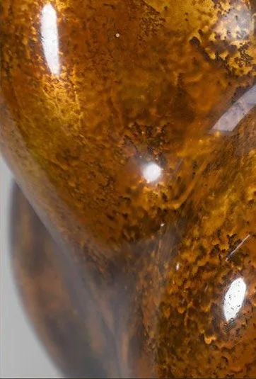 Amber Lacquer Lobed Sculpture, 27 x 40 x 27 cm in rust — detail