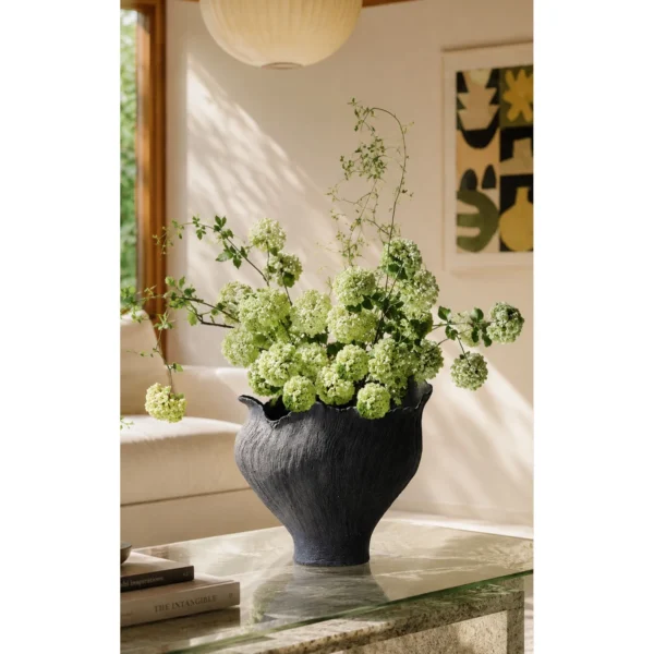 Art Textured Black Ceramic Vase with Torn Rim, Two Forms in black — in a room setting