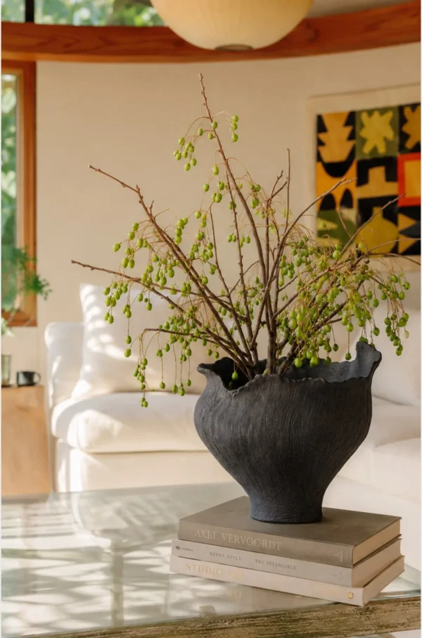 Art Textured Black Ceramic Vase with Torn Rim, Two Forms in black — in a room setting