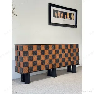Checkerboard Art Veneer Entryway Cabinet on Cone Legs in black — in a room setting