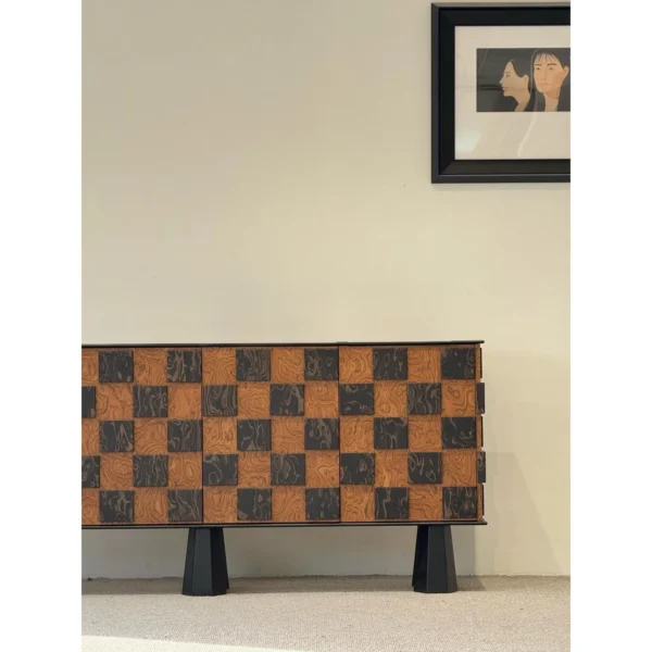 Checkerboard Art Veneer Entryway Cabinet on Cone Legs in black — in a room setting