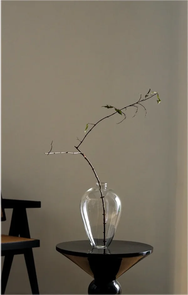 Clear Borosilicate Glass Sphere Vase, Medium in ivory — in a room setting
