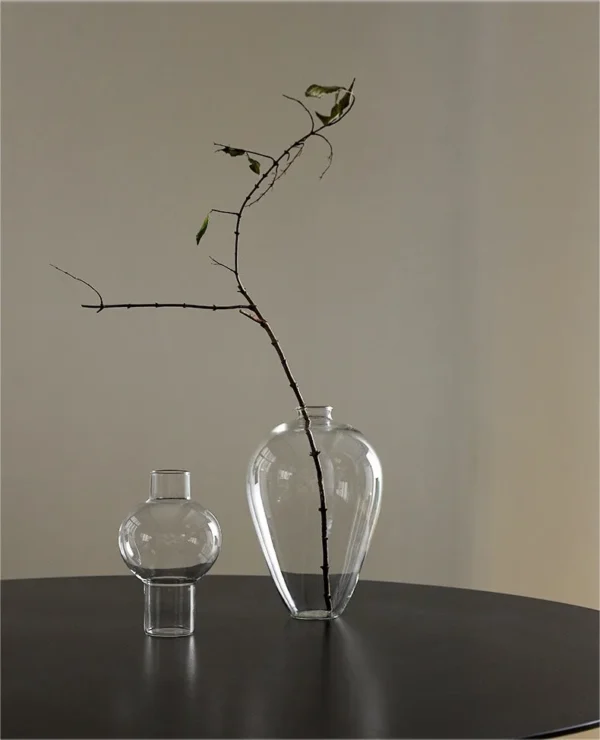 Clear Borosilicate Glass Sphere Vase, Medium in ivory — in a room setting