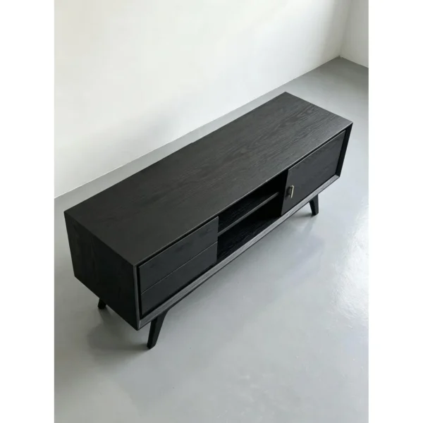Dark Ash TV Stand with Drawer, Open Shelf and Brass Pull in black — in a room setting