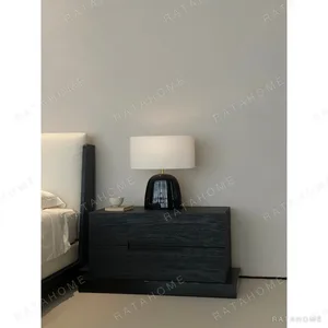 Aspre Oak Bed with Twin Cushion Headboard in black — in a room setting