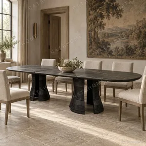 Cangxu Hand-Carved Black Dining Table with Stone Top in black — in a room setting