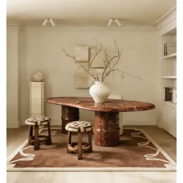 Chilan Yunting Rose Red Marble Coffee Table on Cylinder Base in red — in a room setting
