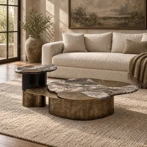 Gilded Hand-Forged Metal Nesting Tables in slate — in a room setting