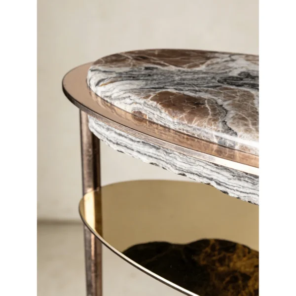 Hand-Forged Metal and Crystal Stone Oval Side Table Set in clay — in a room setting