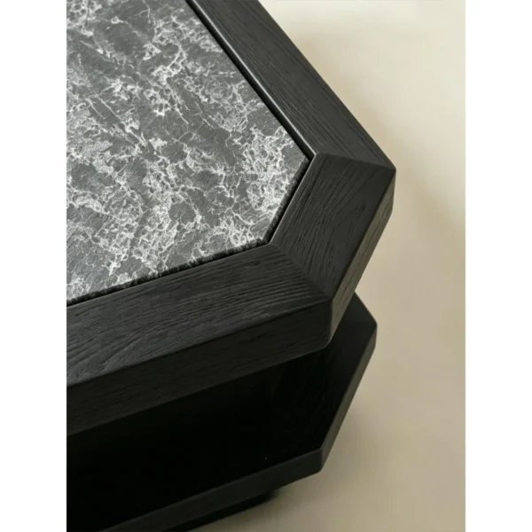 Ink Mountain Black Wood Coffee Table in black — in a room setting