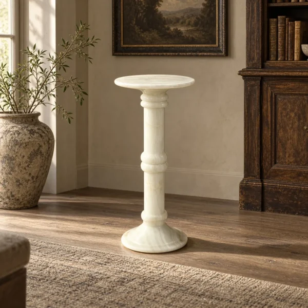 White Onyx Sculpture Pedestal with Flared Base in ivory — in a room setting