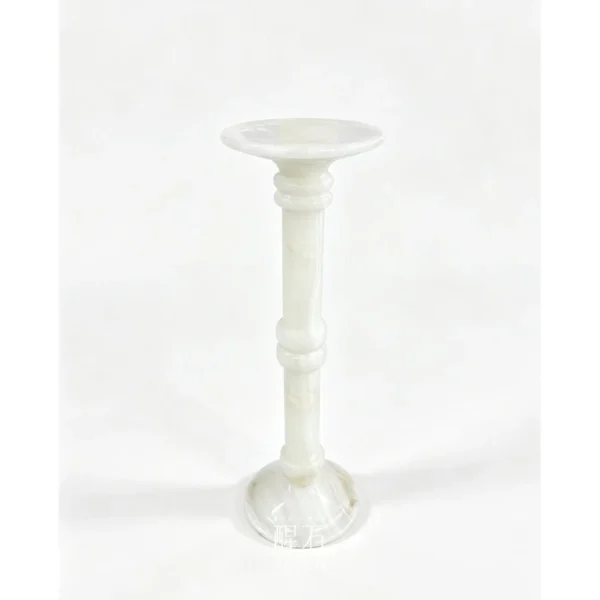 White Onyx Sculpture Pedestal with Flared Base in ivory — in a room setting