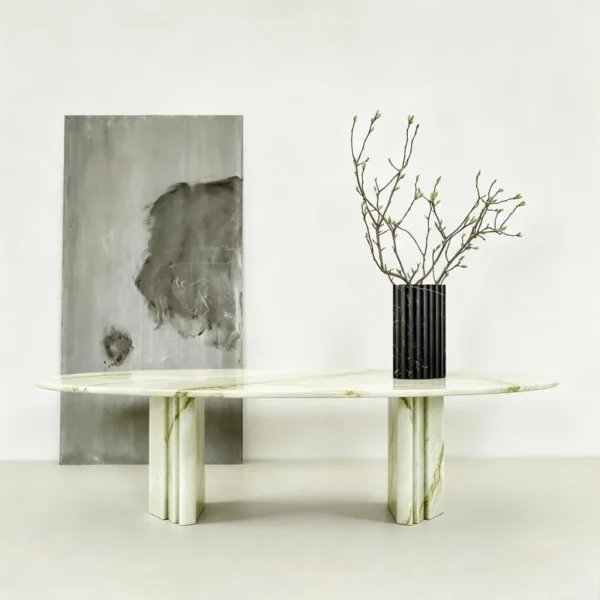 Qin Free-Form Marble Dining Table in ivory — in a room setting