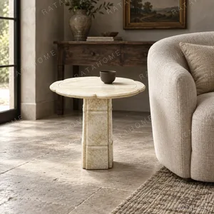 Stone Bone Cloverleaf Side Table in Veined Cream Stone — in a room setting