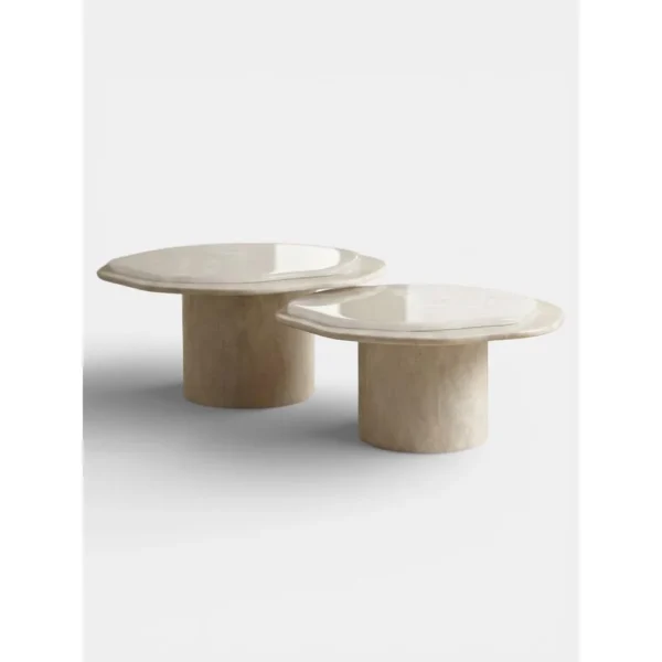 Super White Travertine Nesting Coffee Tables with Lobed Tops in ivory — in a room setting