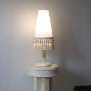 Woven Shadow Fringed Fabric Table Lamp in oatmeal — front view