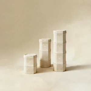 Stone Bone Modular Stone Pedestals, Set of Three Heights in oatmeal — front view