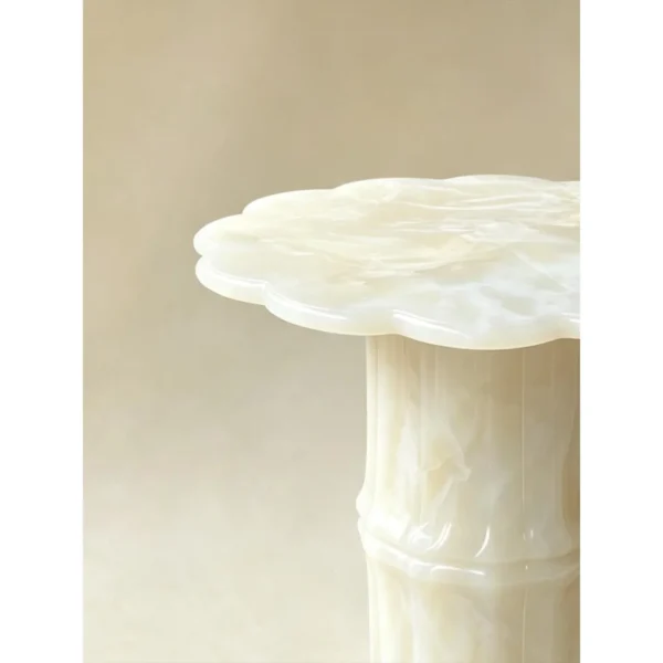 Xuetang Eight-Petal Begonia White Onyx Side Table in ivory — in a room setting