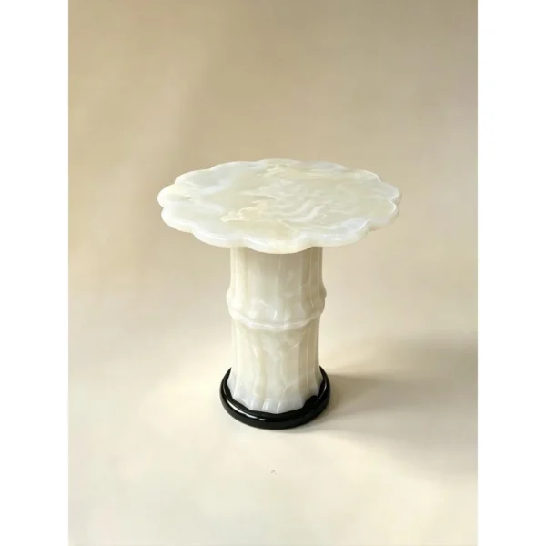 Xuetang Eight-Petal Begonia White Onyx Side Table in ivory — in a room setting