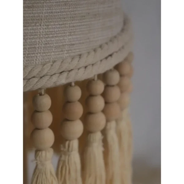 Yunluo Fringed Linen Cone Table Lamp with Wooden Beads in oatmeal — in a room setting