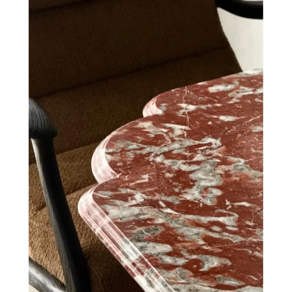 Yunqi Oriental Red Marble Side Table with Notched Top in red — in a room setting