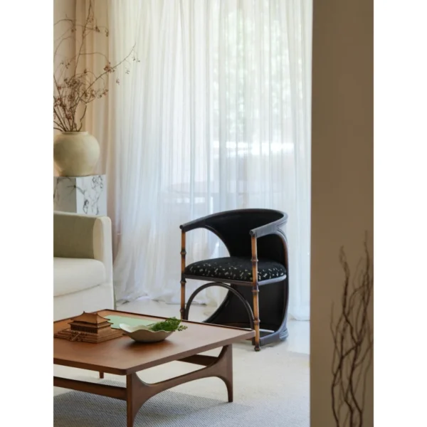 Teak Coffee Table with Raised Edge Tray Top on Sculpted Base in walnut — in a room setting