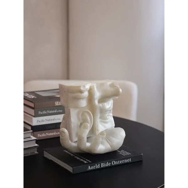 Balance Double-Sided Face Sculpture in Jade-Effect White — in a room setting