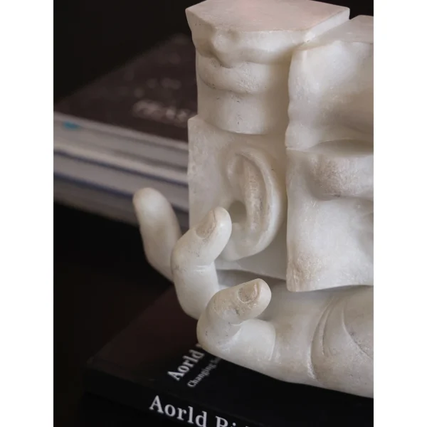 Balance Double-Sided Face Sculpture in Jade-Effect White — in a room setting