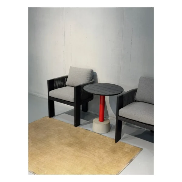 Outdoor Rope-Woven Armchair Set with Teak Pedestal Table in black — in a room setting