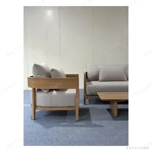 Arched Aluminium Outdoor Sofa Set in Teak-Look Finish — in a room setting
