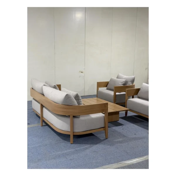 Arched Aluminium Outdoor Sofa Set in Teak-Look Finish — in a room setting