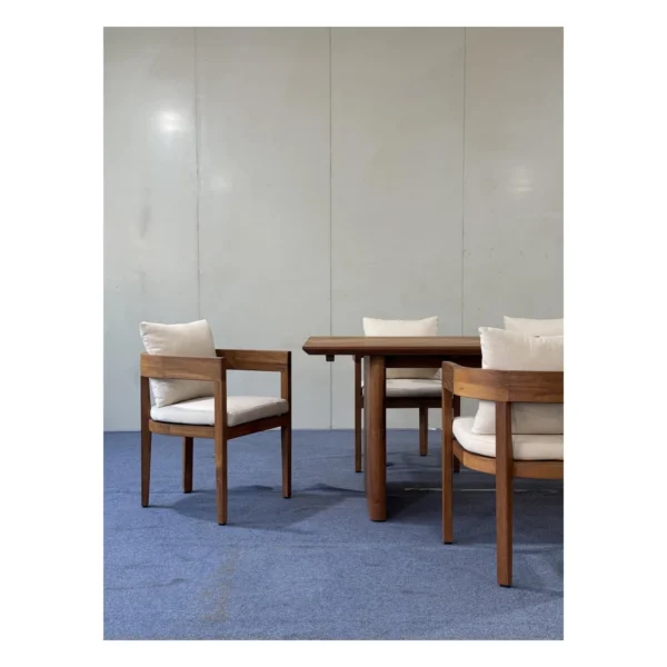 Yacht-Grade Burmese Teak Outdoor Dining Set with Armchairs in clay — in a room setting