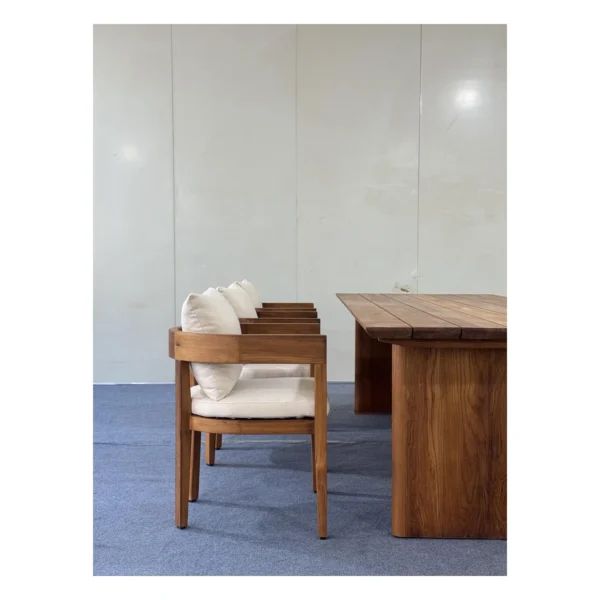 Yacht-Grade Burmese Teak Outdoor Dining Set with Armchairs in clay — in a room setting